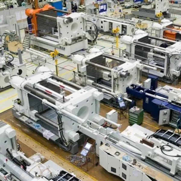 A factory floor with many machines in it